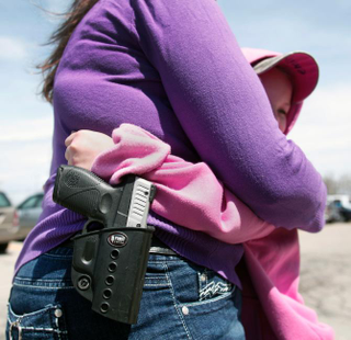 Illustration for article titled John Crawford Case: It’s Open Carry for Whites and Open Season on Blacks